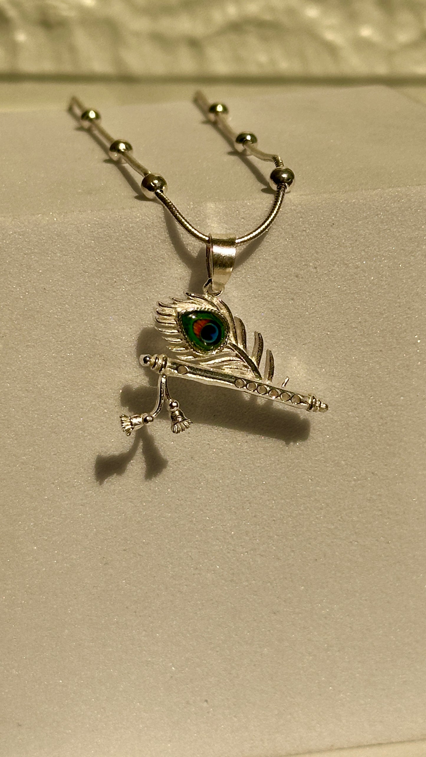 feather & flute locket