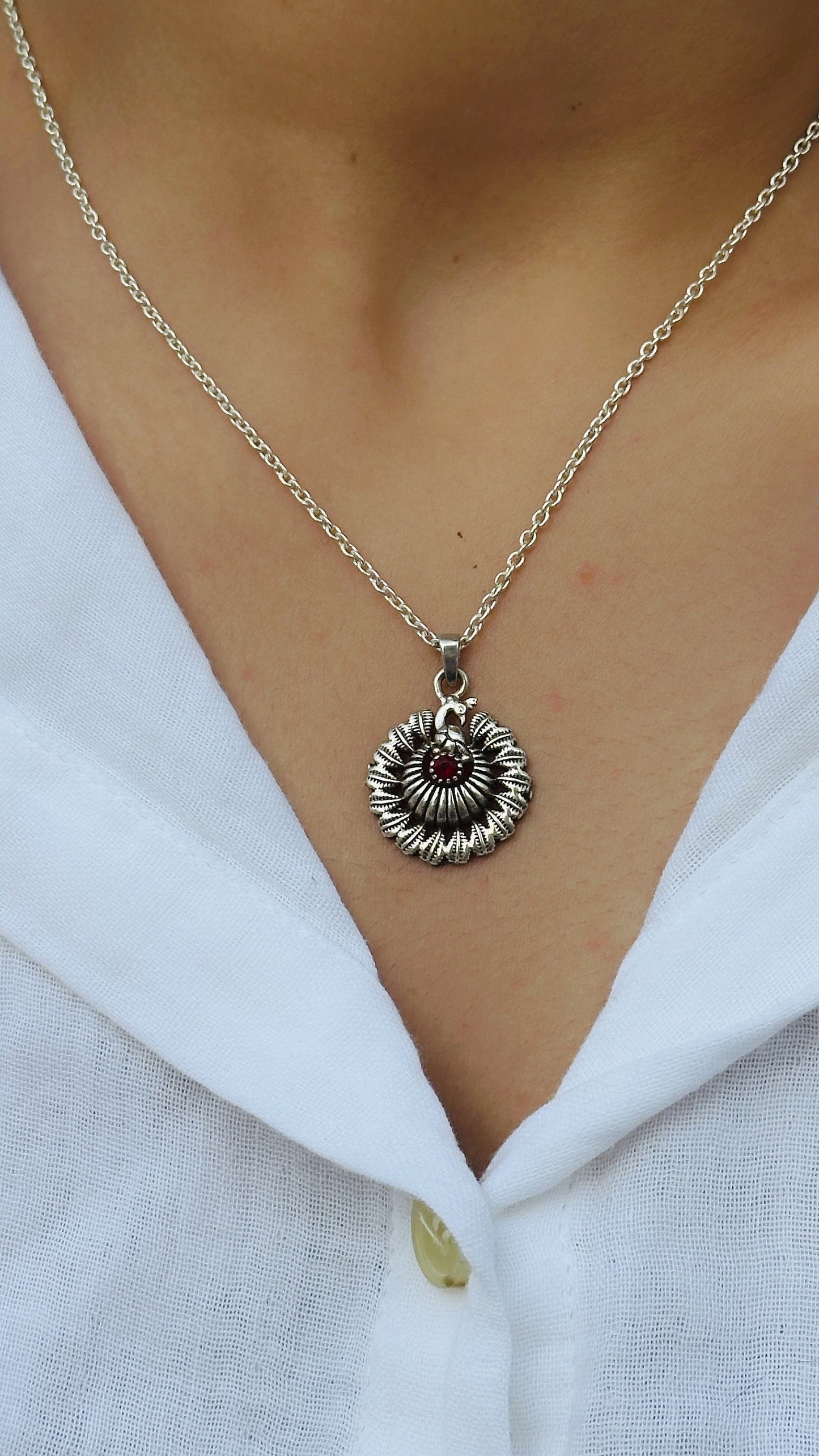 dancing peacock pendant