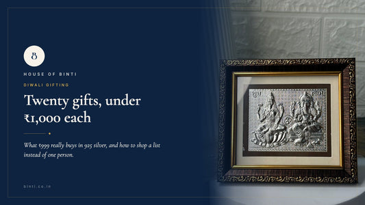 Four ₹799 925 silver Diwali gifts laid flat: two oxidised nose pins, a Laxmi Ganesh frame and a silver paduka.