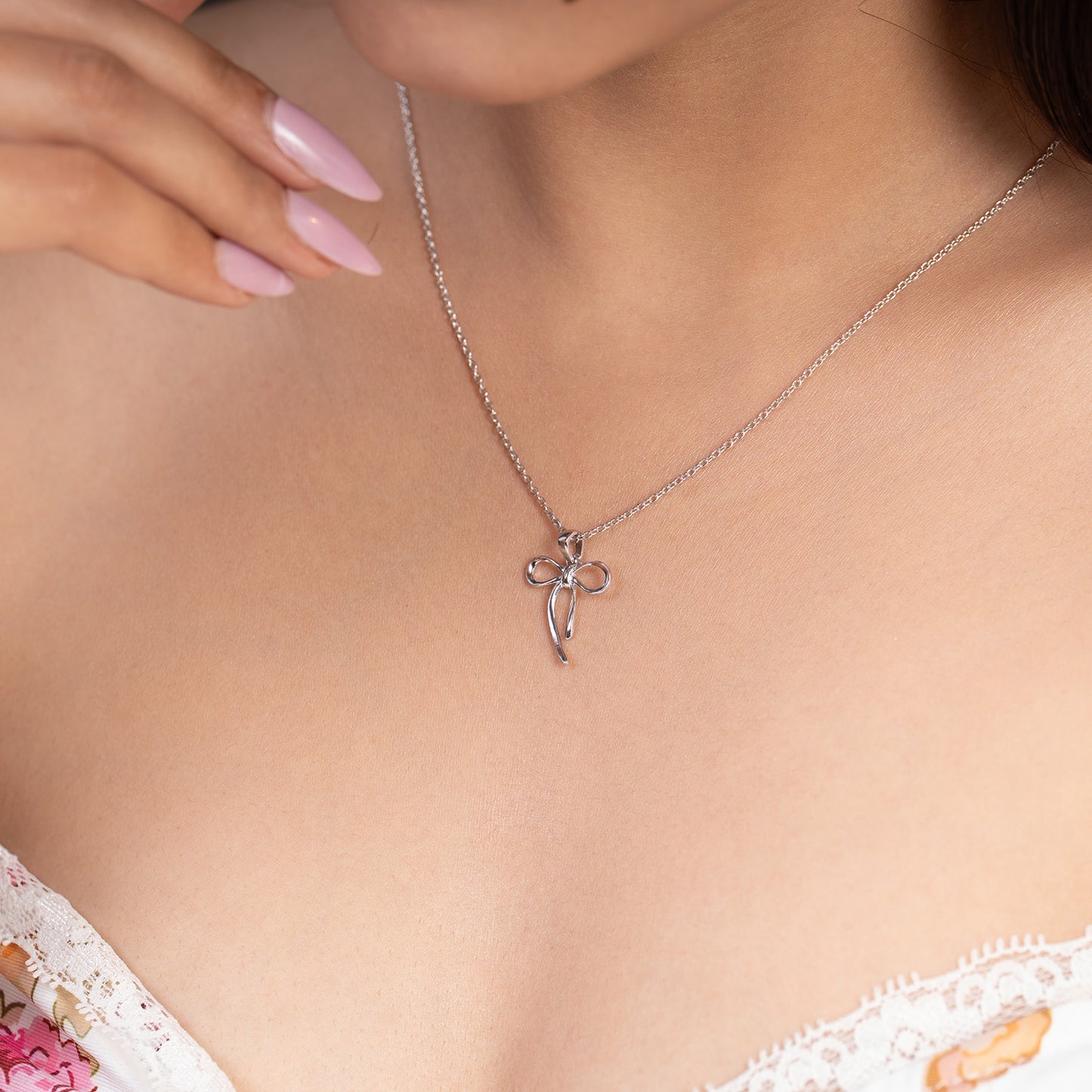 sterling bow neckpiece
