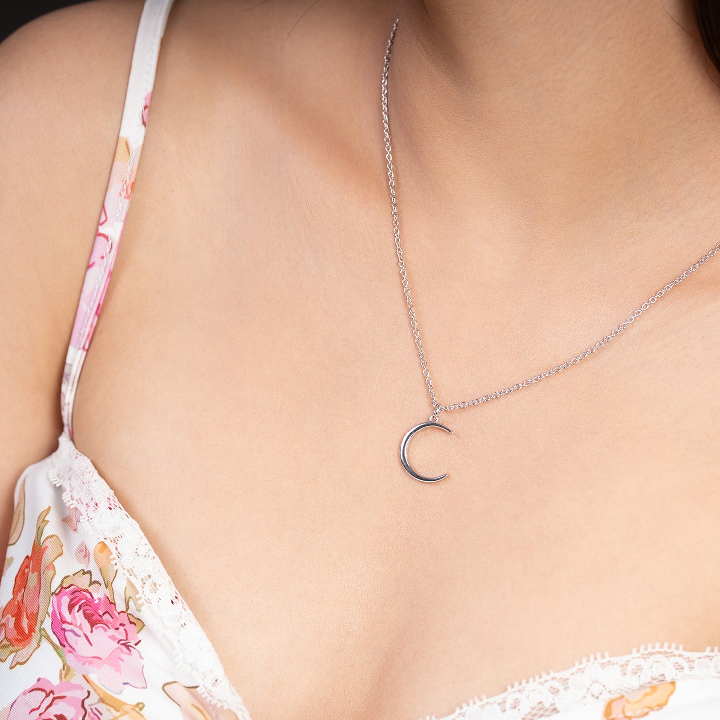 silver crescent neckpiece