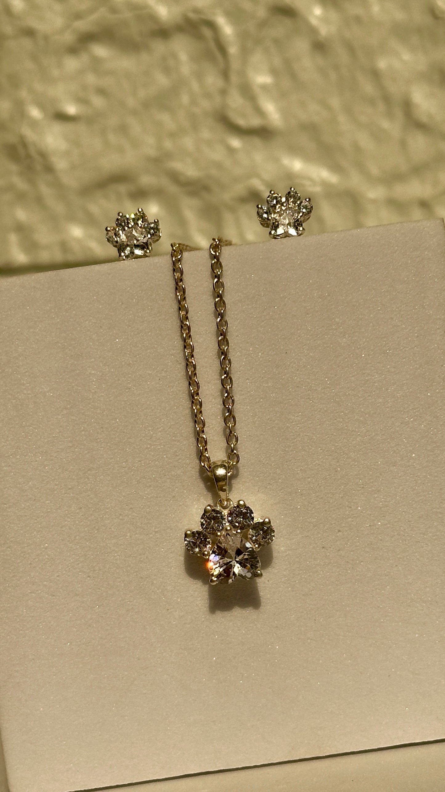 crystal paw pendant set
