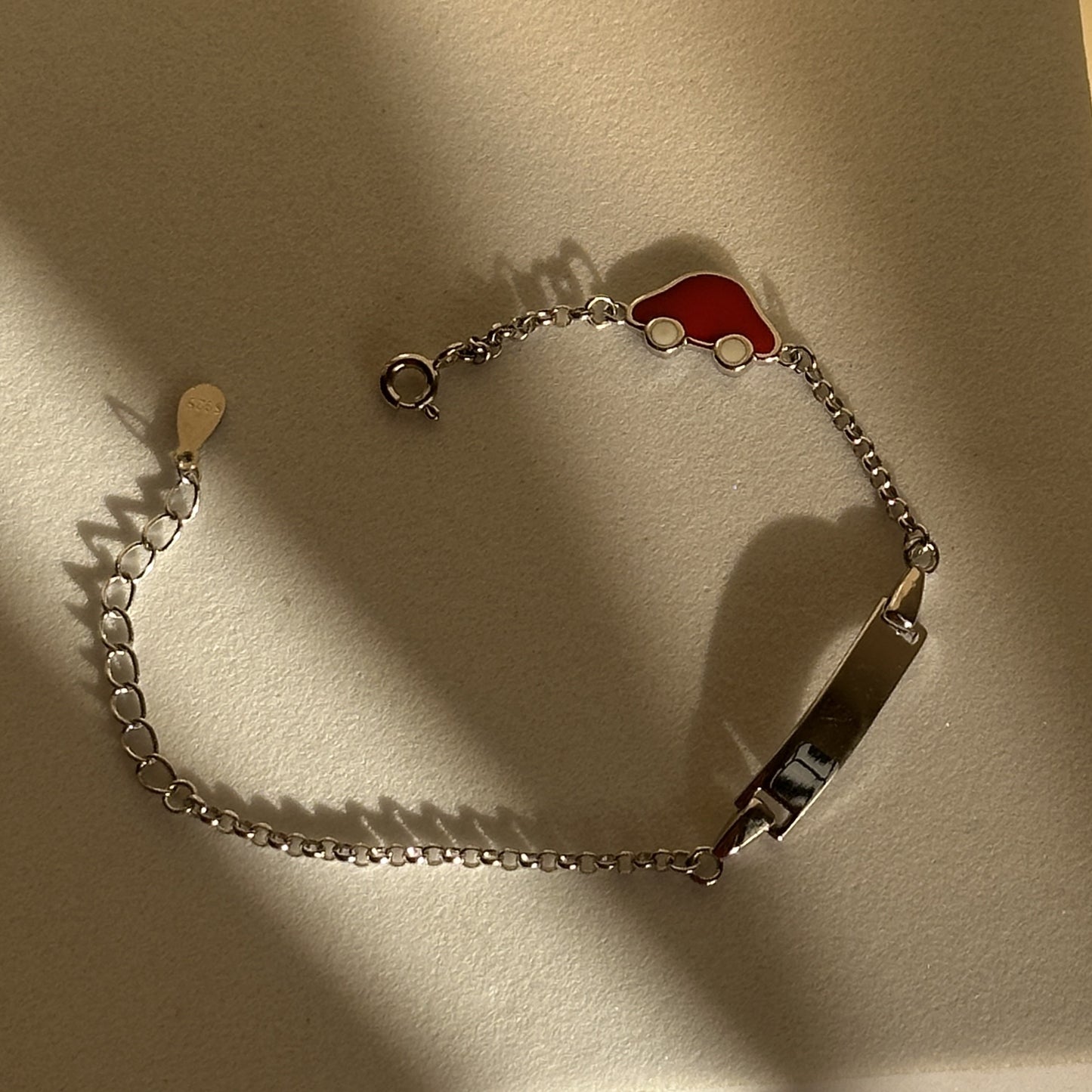racy red charm baby bracelet