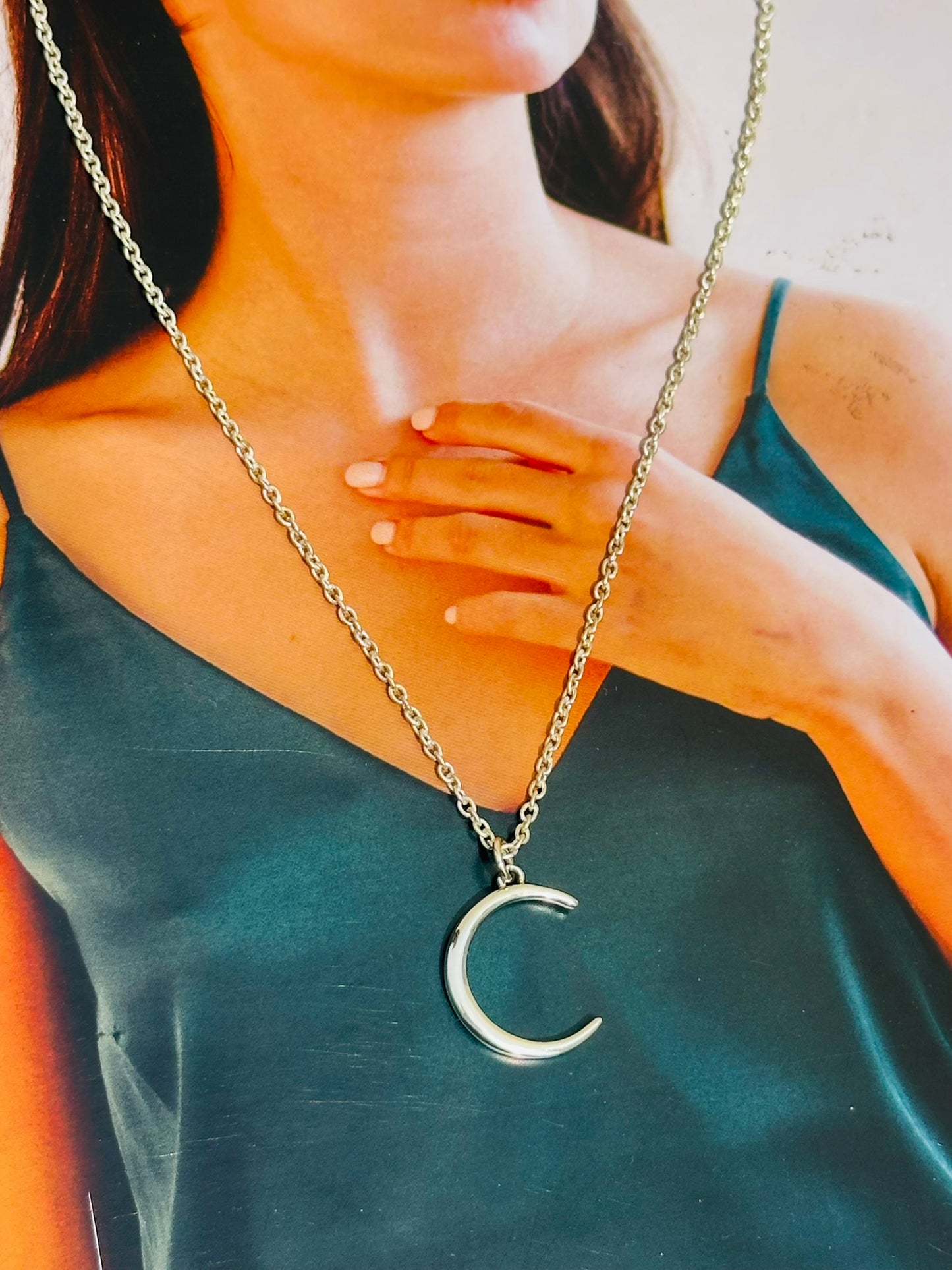 silver crescent neckpiece