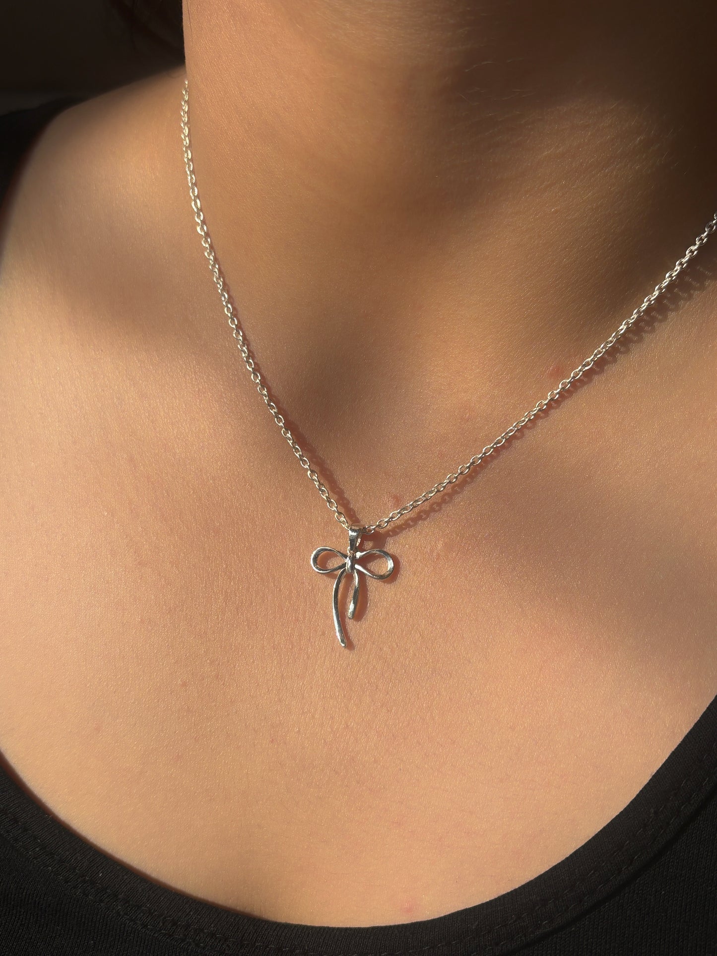 sterling bow neckpiece