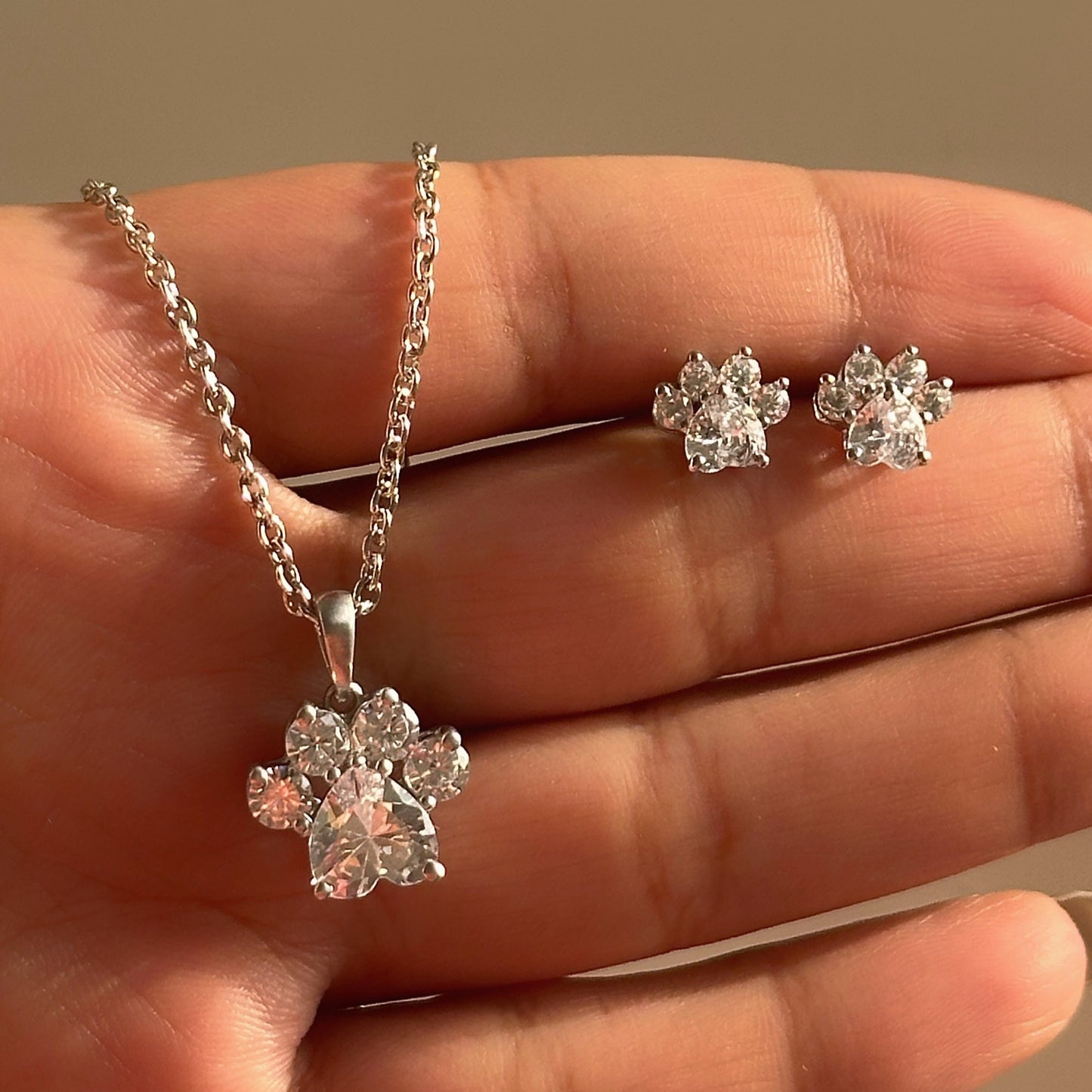 crystal paw pendant set