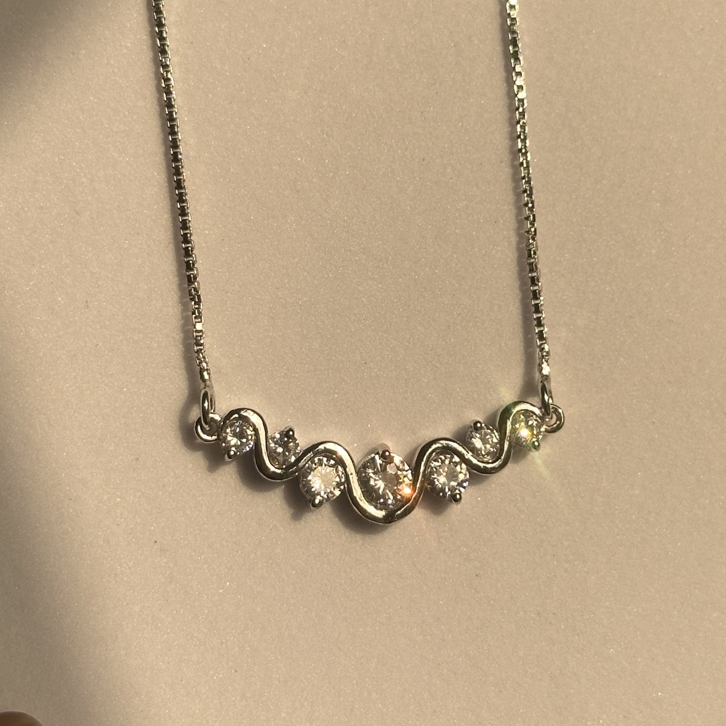wavy spark neckpiece
