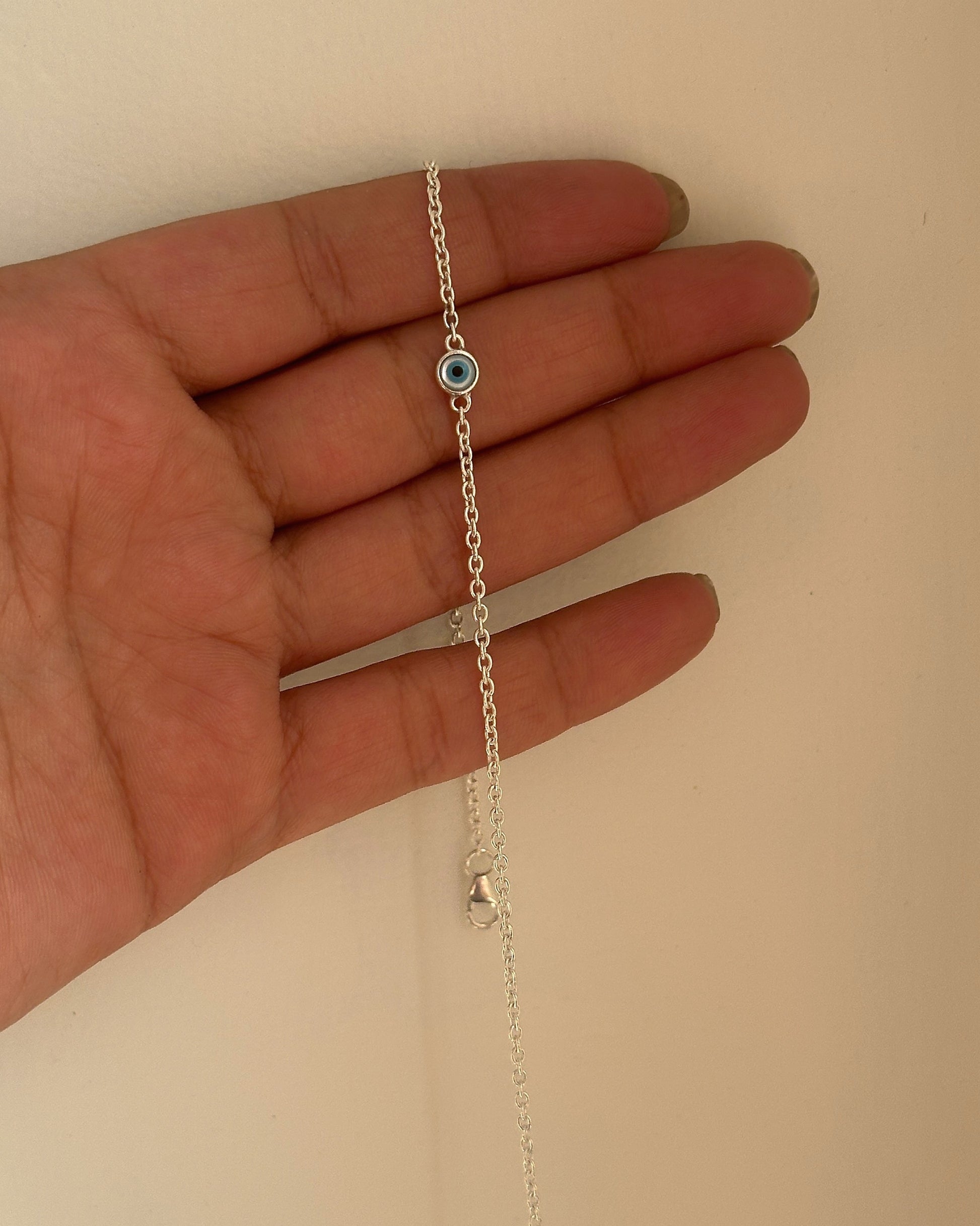 Minimal Nazar Anklet worn on ankle — 925 silver nazar payal