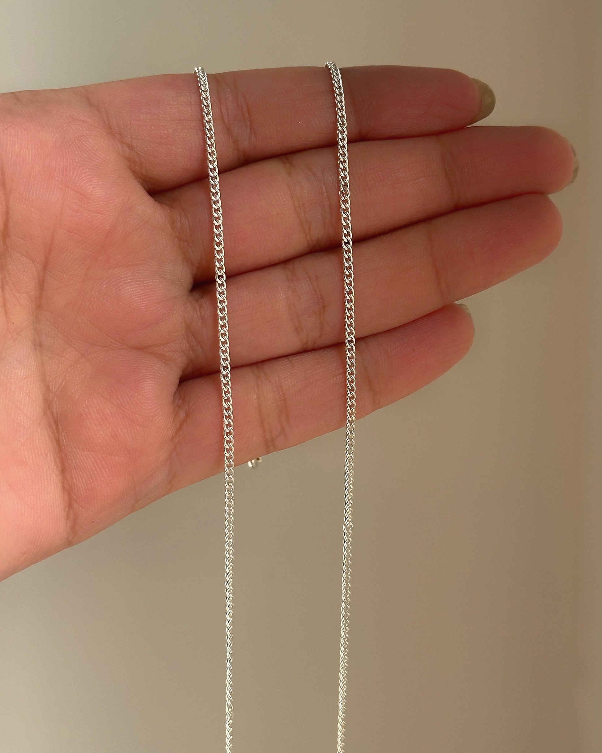 Sleek Cuban Anklet close-up — flat Cuban link chain detail