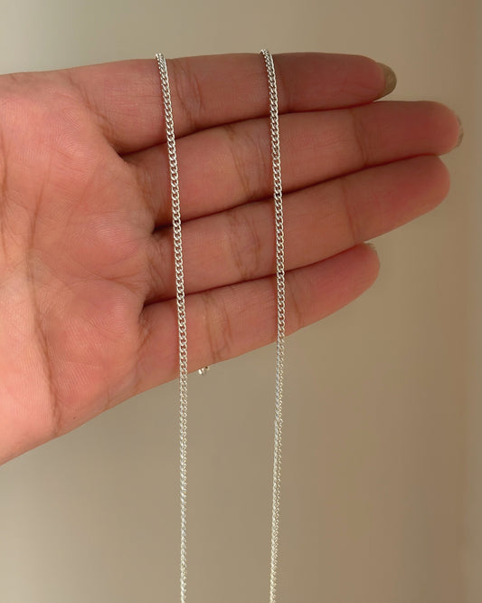 Sleek Cuban Anklet close-up — flat Cuban link chain detail