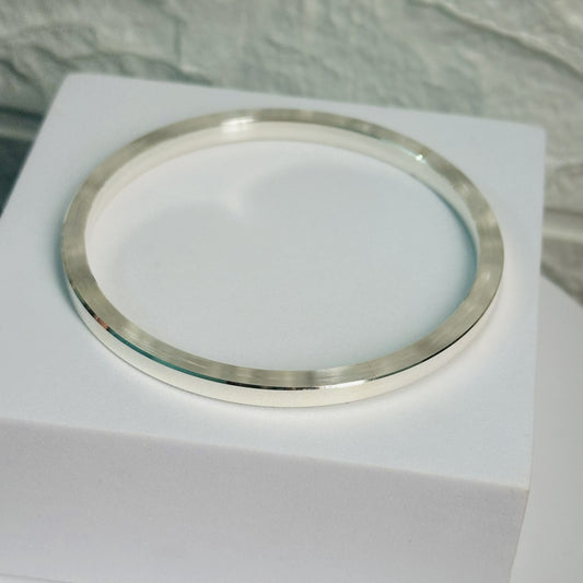 Eternal Edge Kada worn on wrist — solid 925 silver kada