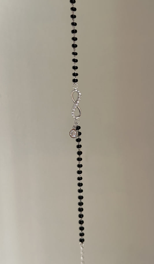 Infinity Drop Hand Mangalsutra close-up — hanging zircon charm detail