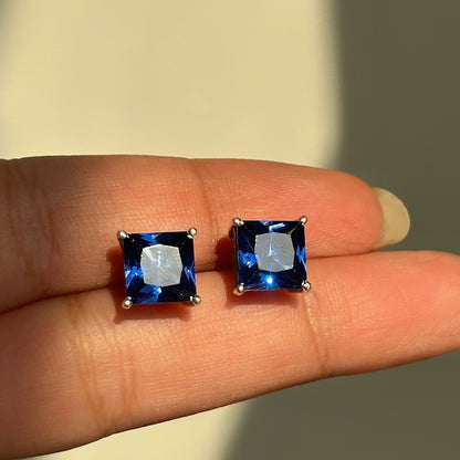 Sapphire Square Studs close-up — blue zircon square-cut stone detail