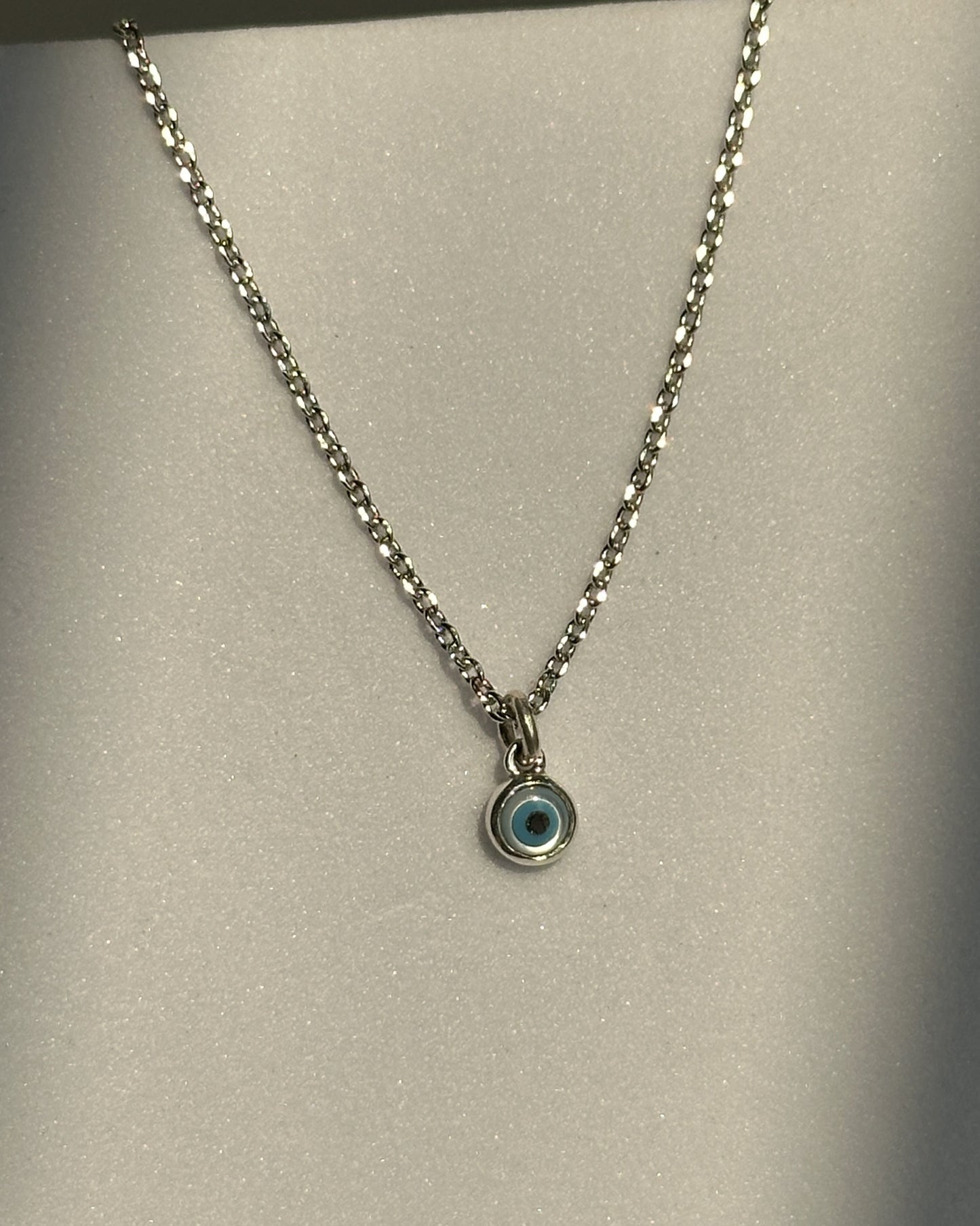 tiny evil eye neckpiece worn — minimal 925 silver nazariya necklace