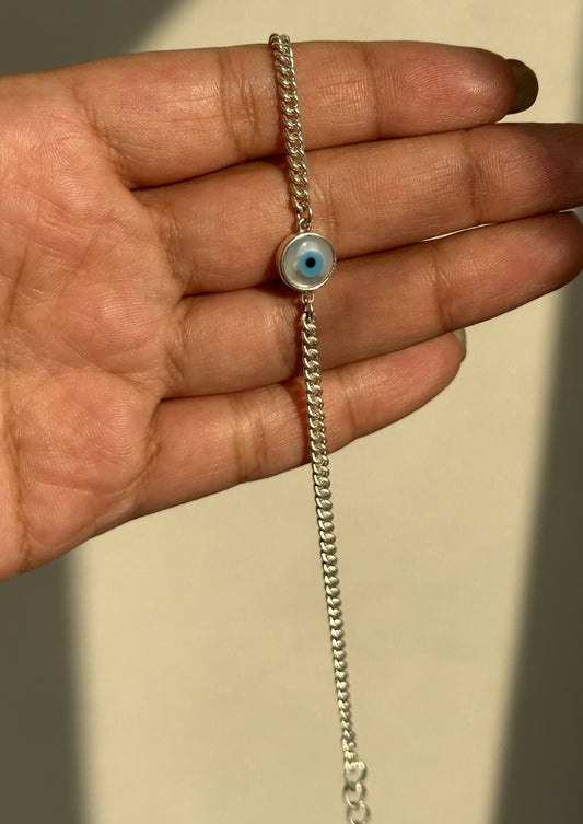 Good Vibes Bracelet worn on wrist — 925 silver evil eye bracelet