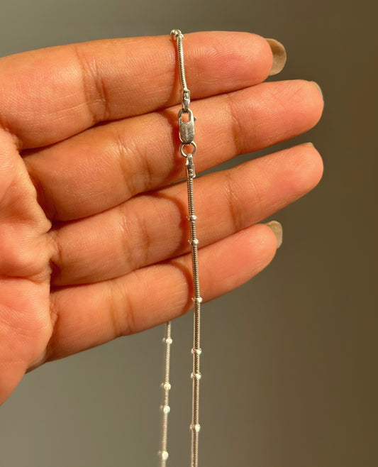 Dainty Dot Chain close-up — snake chain and dot accent detail