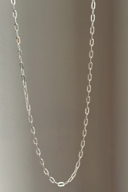 Classic Clip Chain close-up — elongated clip link detail in silver