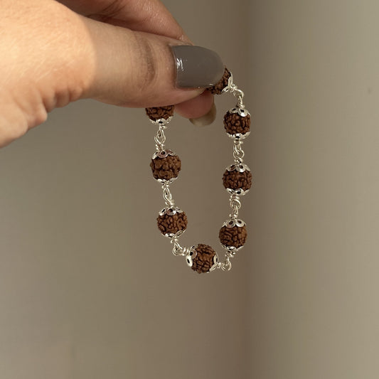 Little Rudra Bracelet on a child's wrist — 925 silver rudraksha bracelet