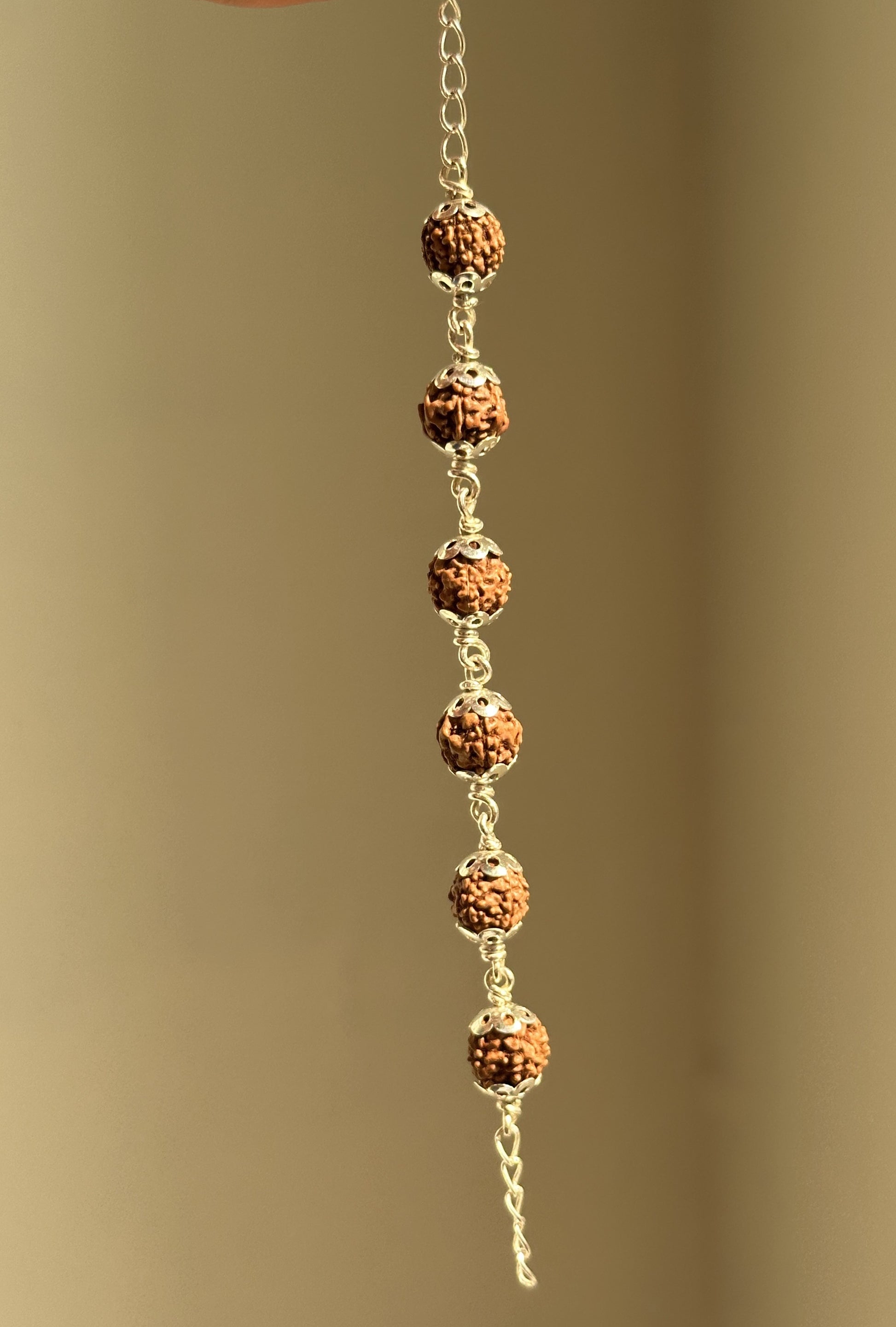 Rudra Grace Bracelet close-up — linked rudraksha and silver detail