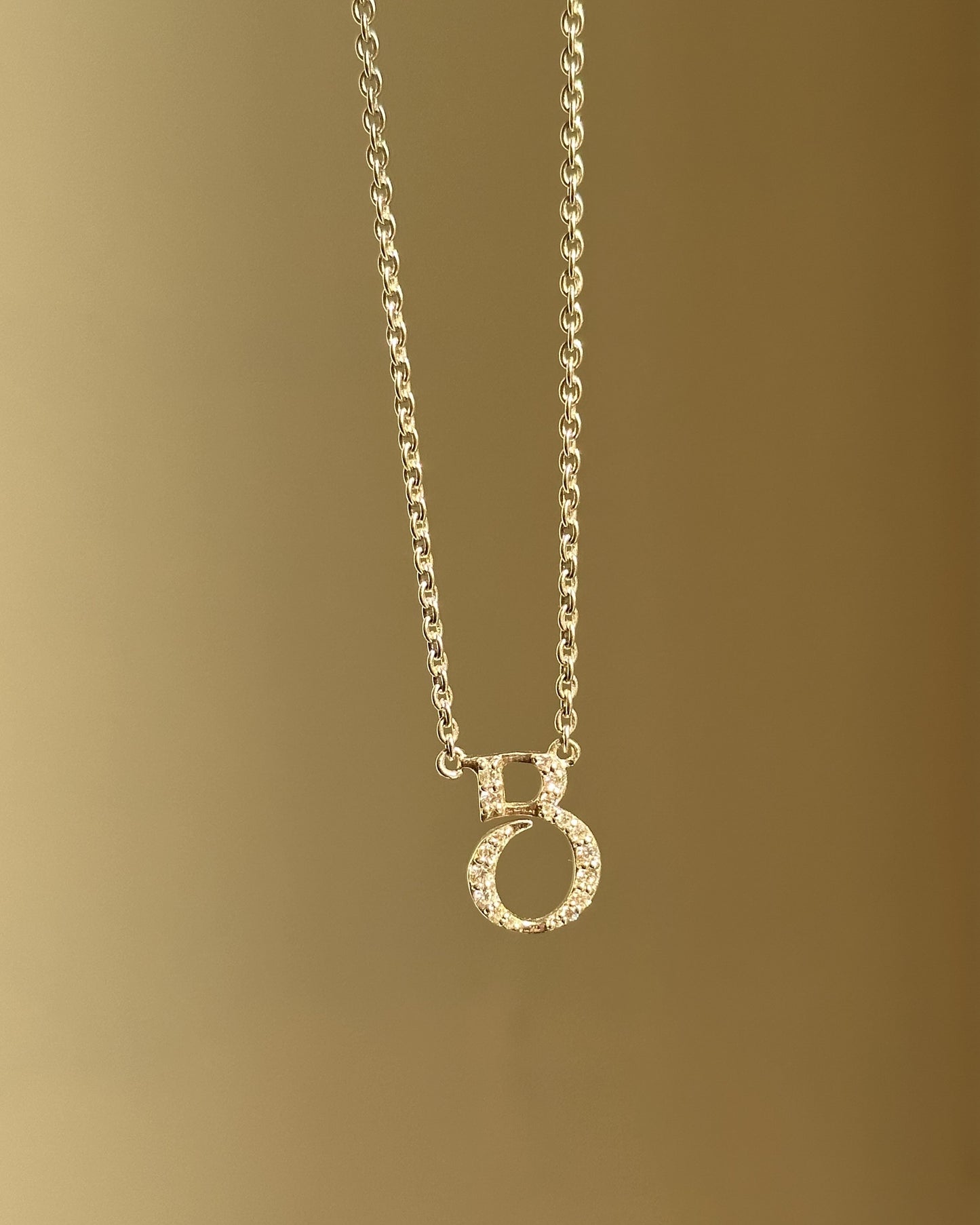 signature initial neckpiece