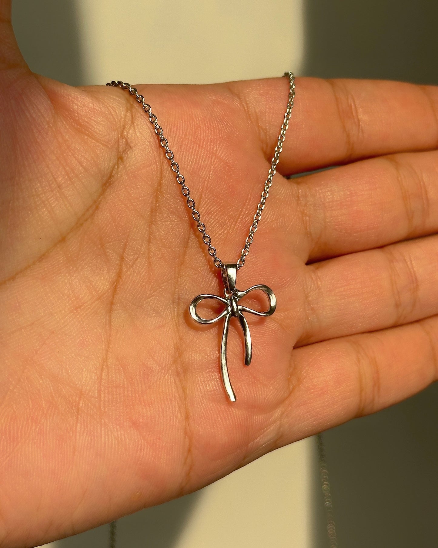 sterling bow neckpiece
