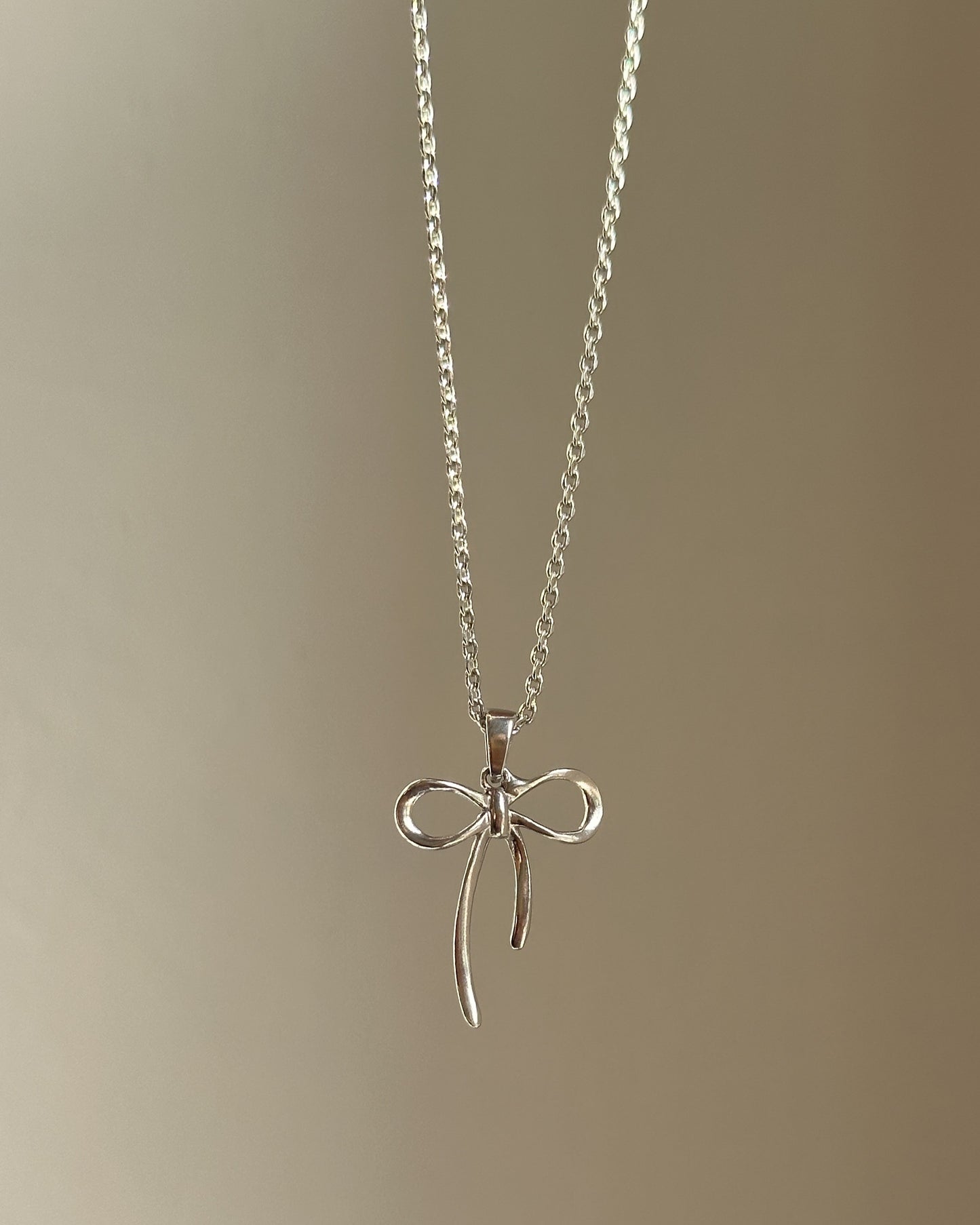 sterling bow neckpiece