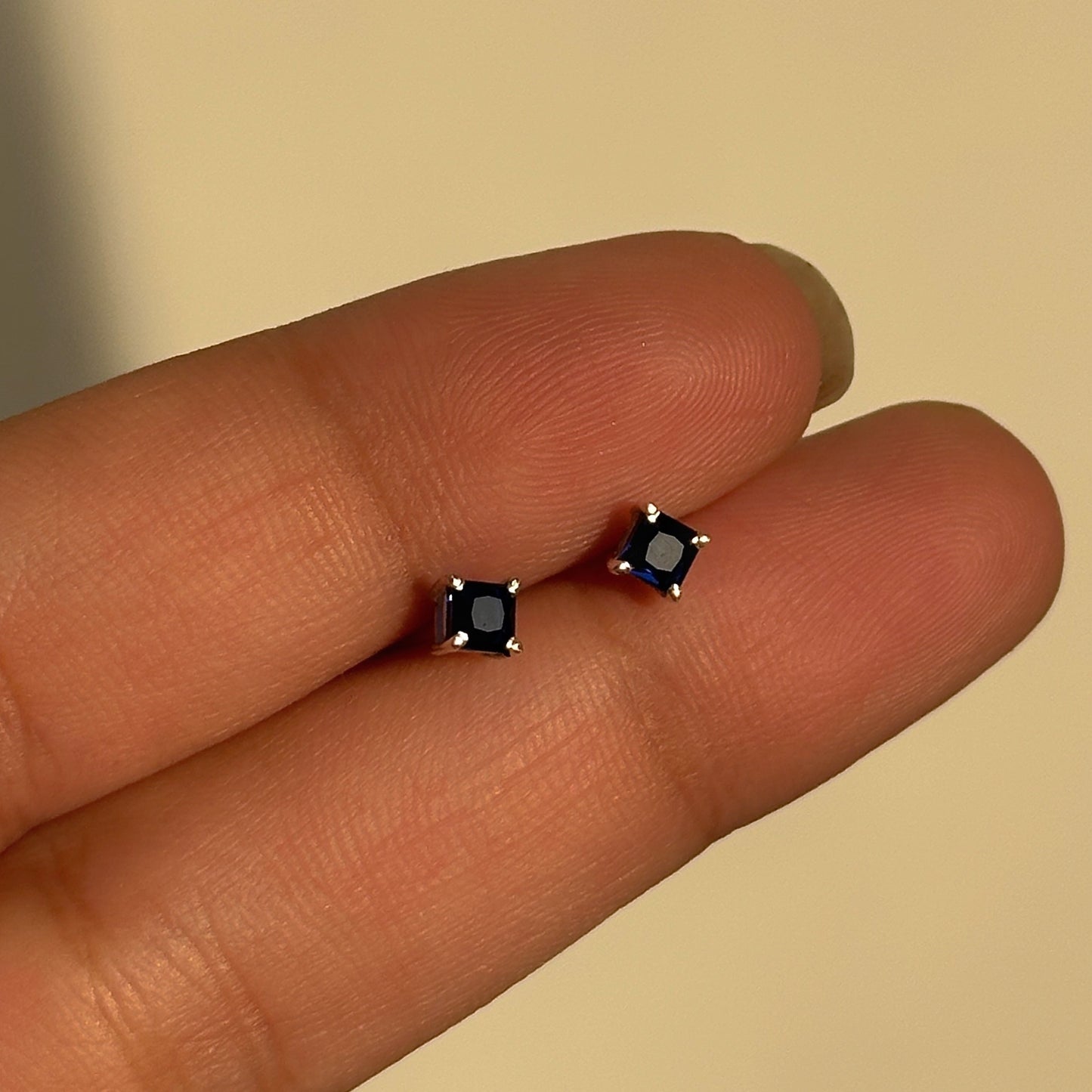 sapphire square studs 3mm close-up — square-cut blue stone detail