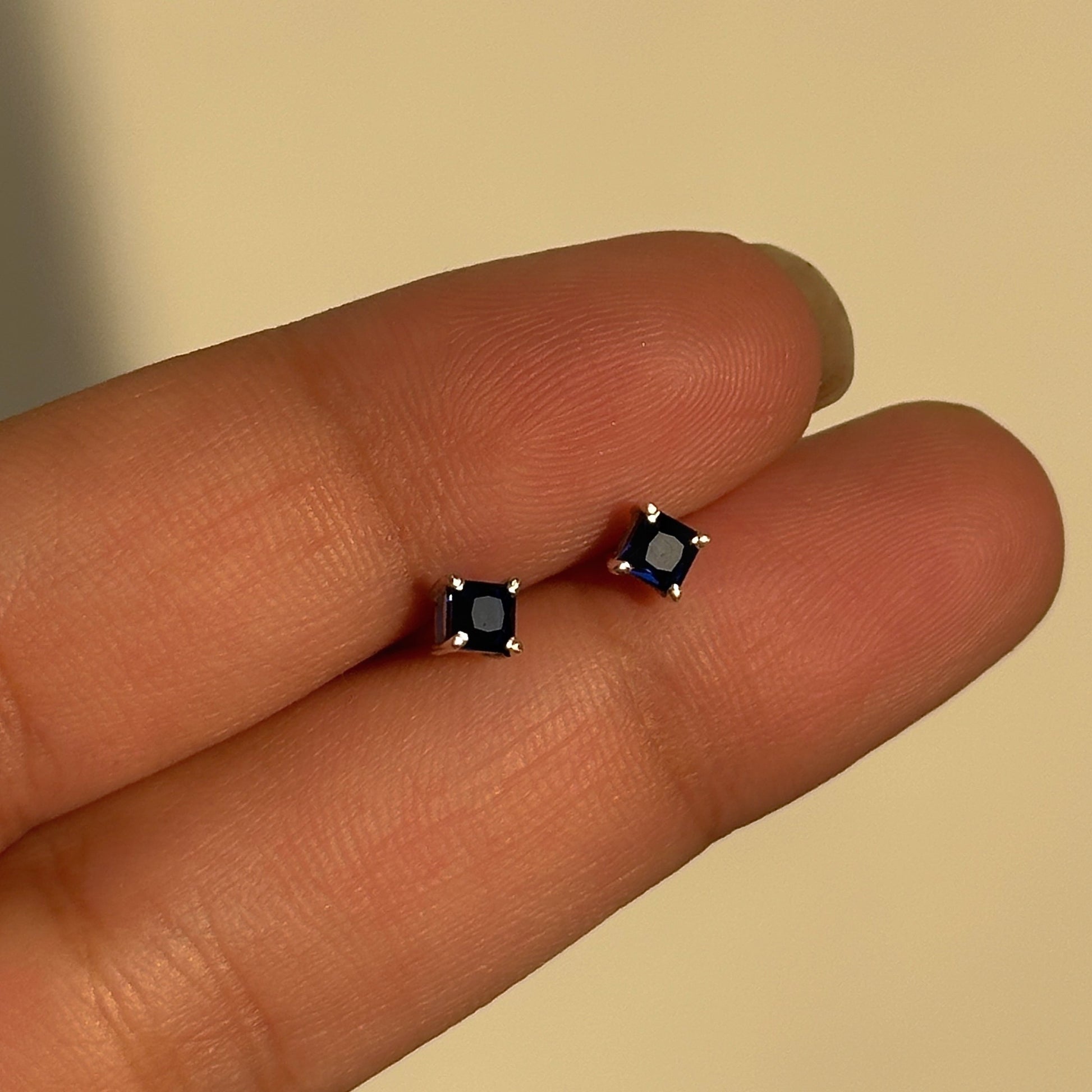 Sapphire Square Studs 3mm close-up — square-cut blue stone detail