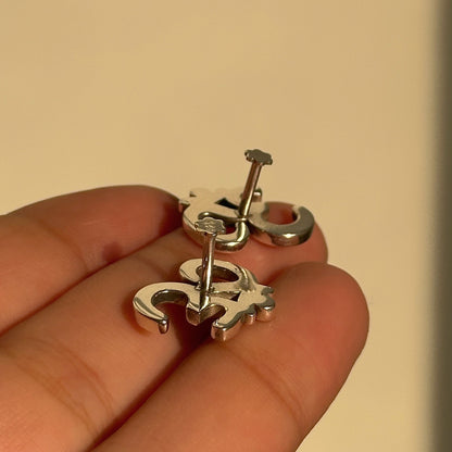 Om Bless Studs close-up — 14mm silver Om symbol detail