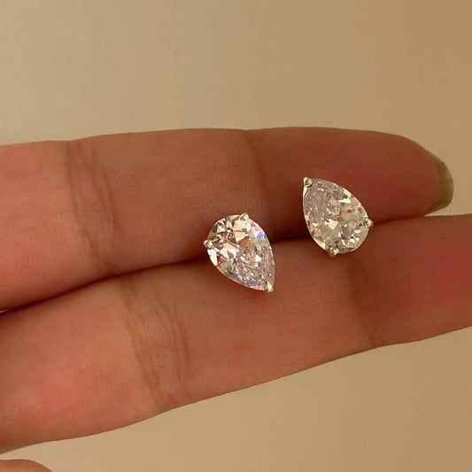 Pear cut stud close-up — pear-shaped stone detail in silver setting