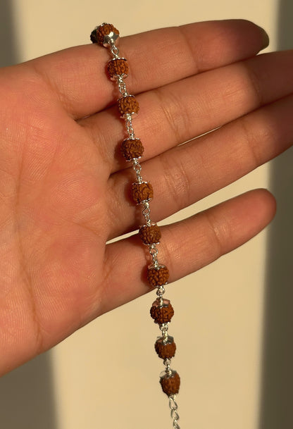 Rudra Grace Bracelet worn on wrist — adult 925 silver rudraksha bracelet