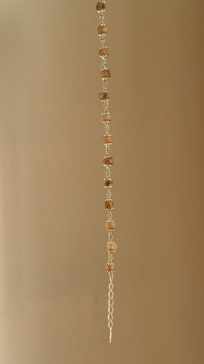 Sacred Tulsi Bracelet worn on wrist — 925 silver tulsi bead bracelet