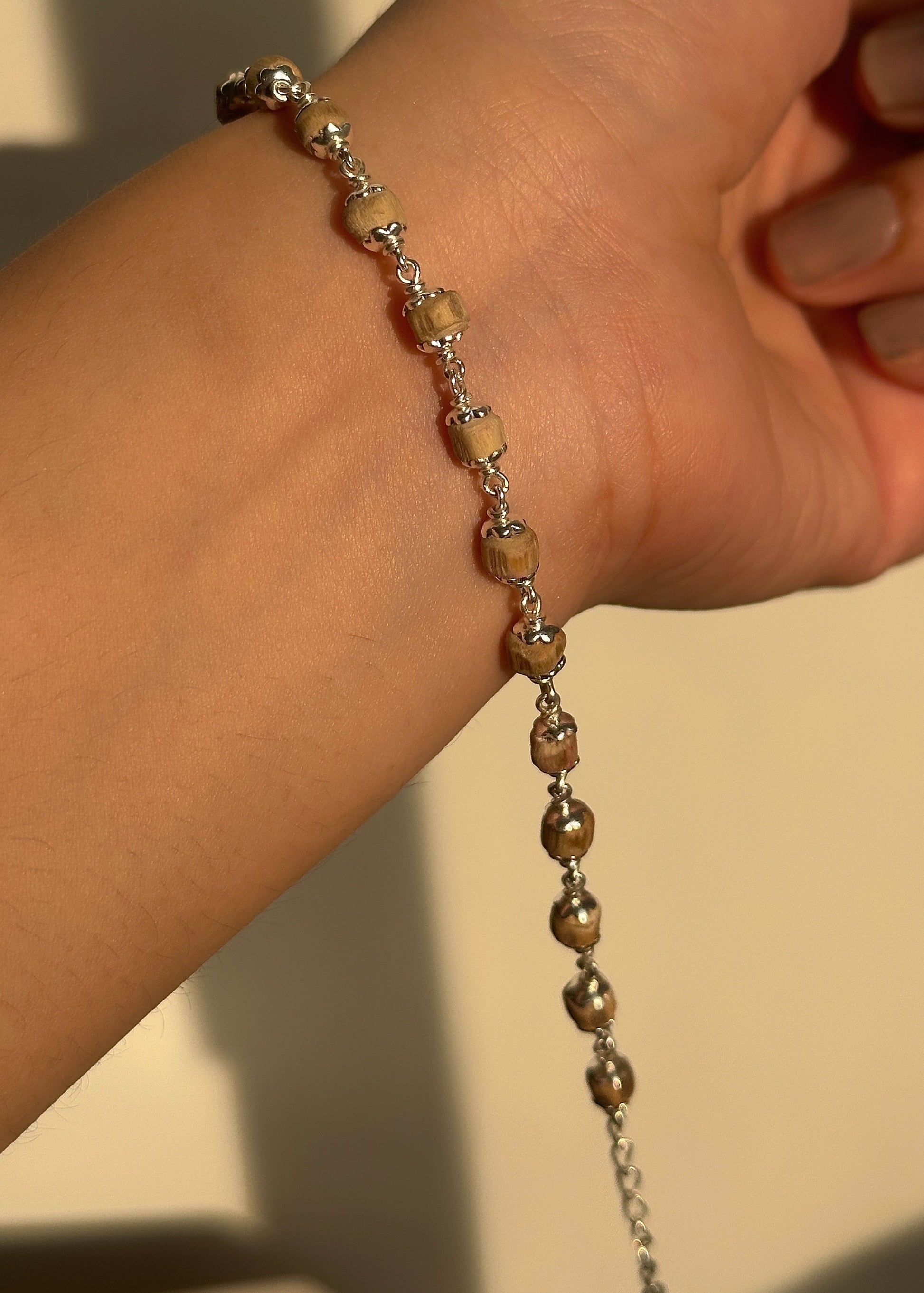 Sacred Tulsi Bracelet — natural tulsi beads with 925 sterling silver detailing