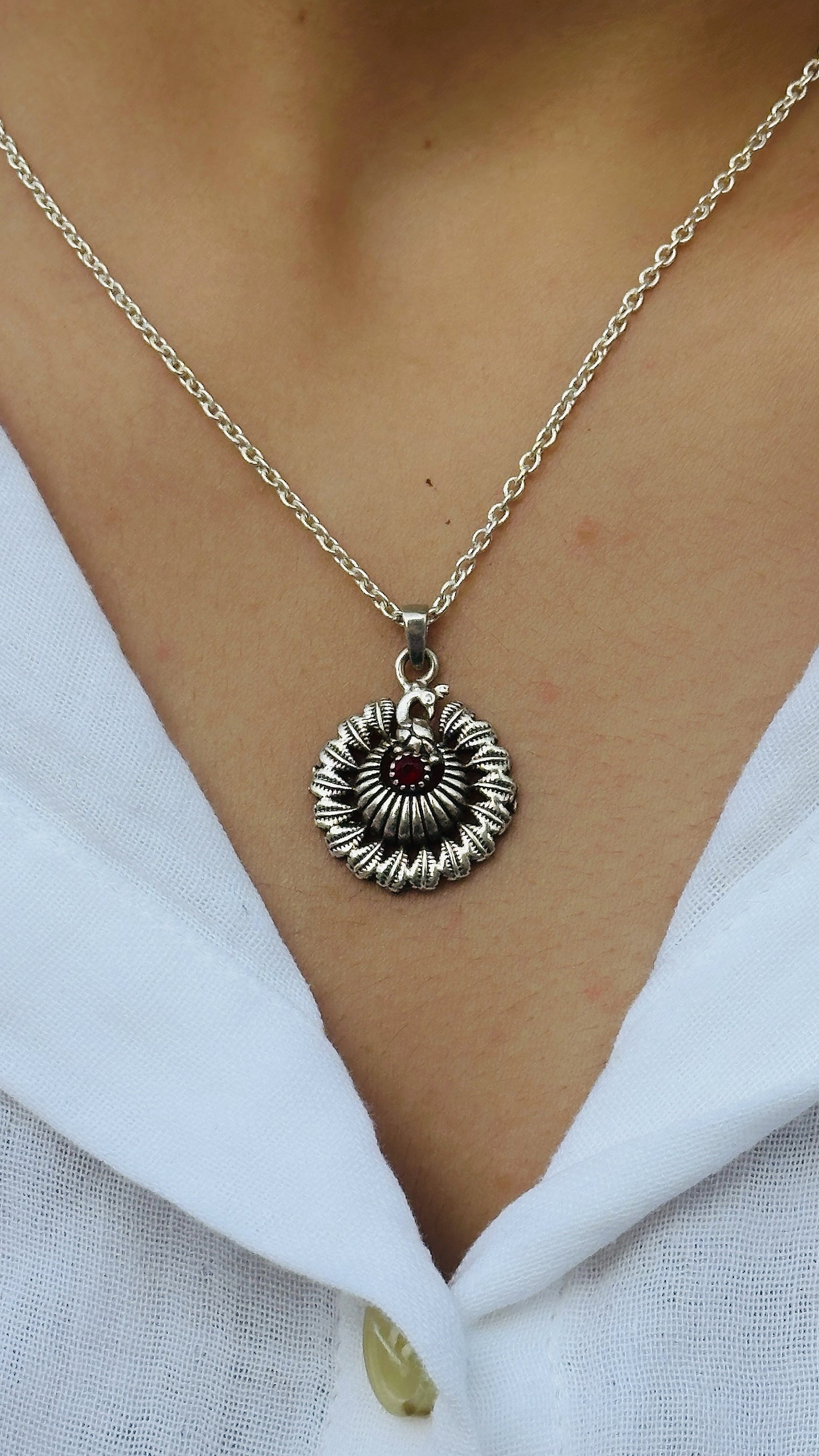 dancing peacock pendant